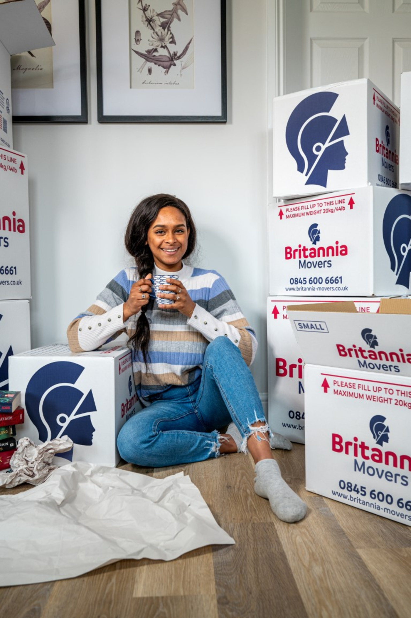 Woman with boxes smiling